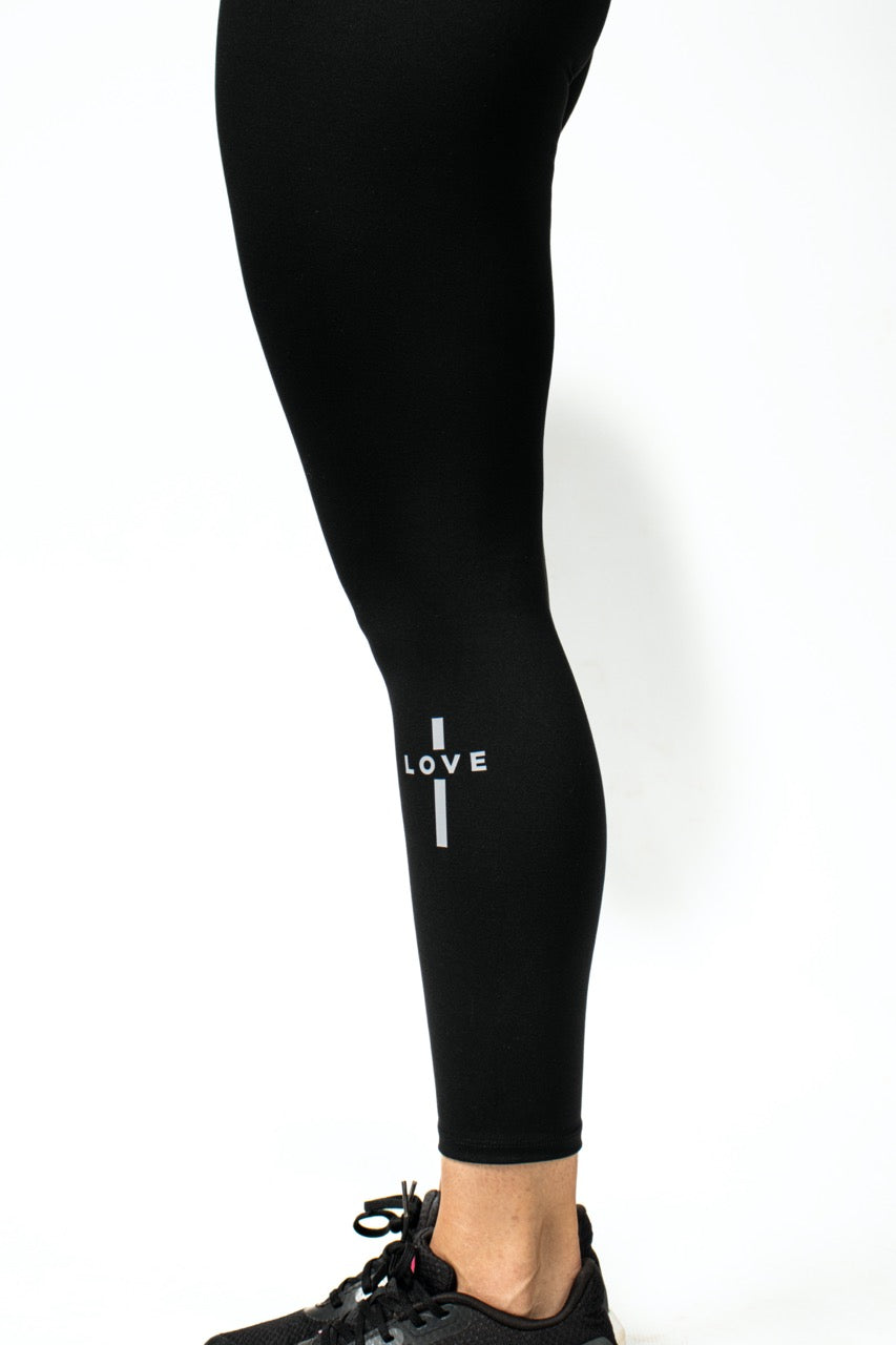Elev8 black leggings cross detail leg — Christian fitness apparel South Africa