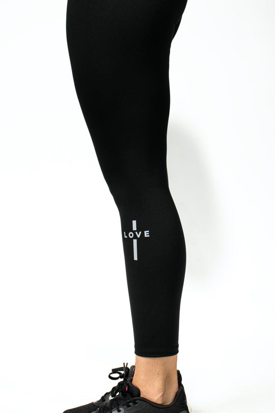 Elev8 black leggings cross detail leg — Christian fitness apparel South Africa