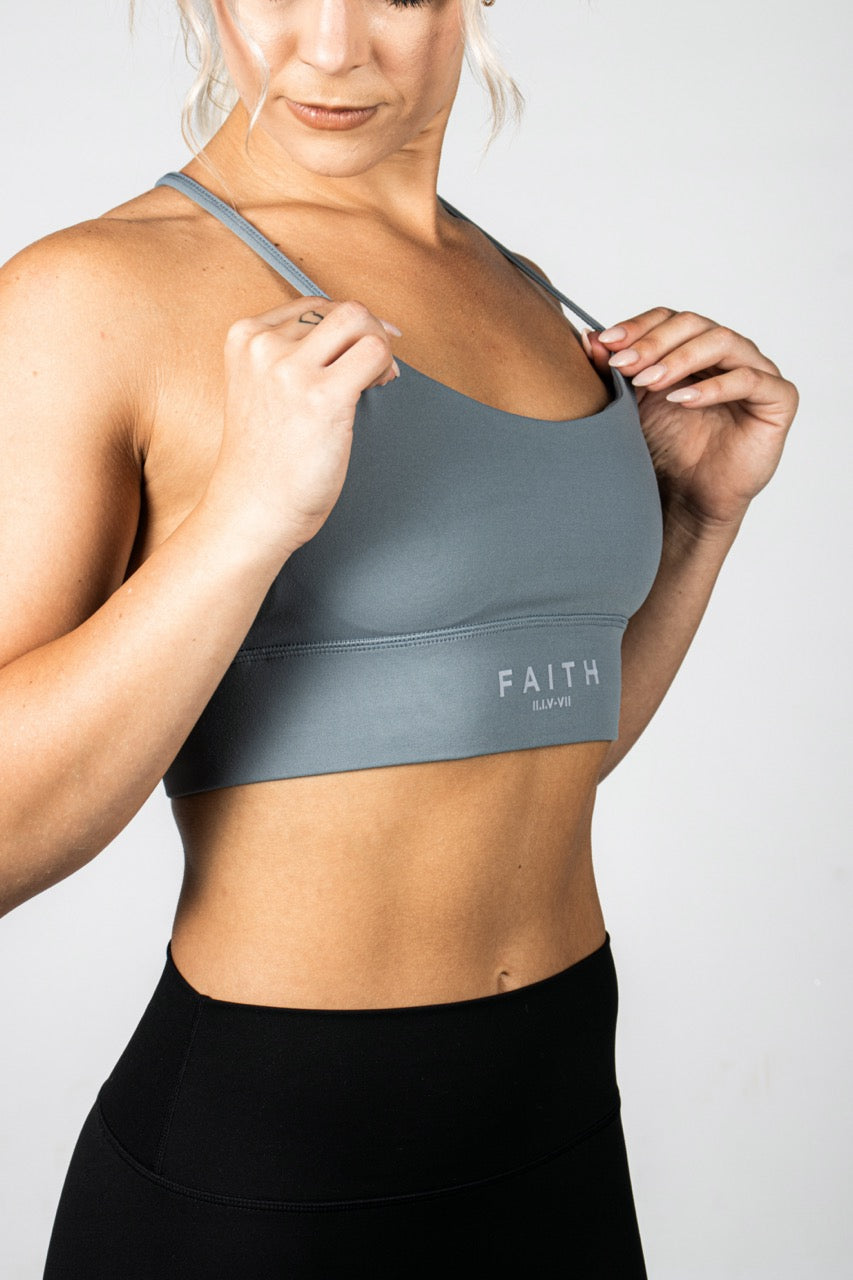 Elev8 blue training bra strap detail — womens fitness wear SA