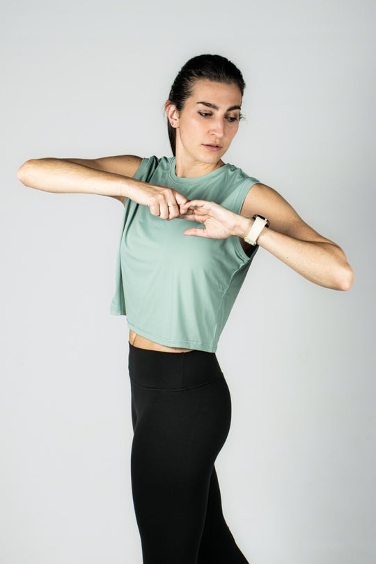 Elev8 green crop gym tank arm detail — womens activewear South Africa
